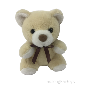 Peluche de oso beige con cinta